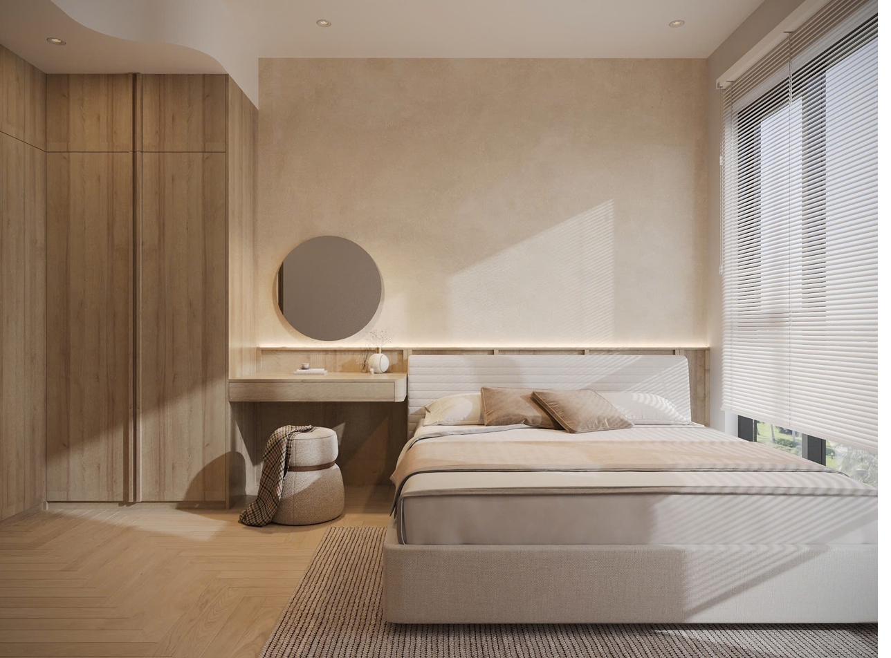 Primary suite with upholstered bed, oak vanity and round mirror