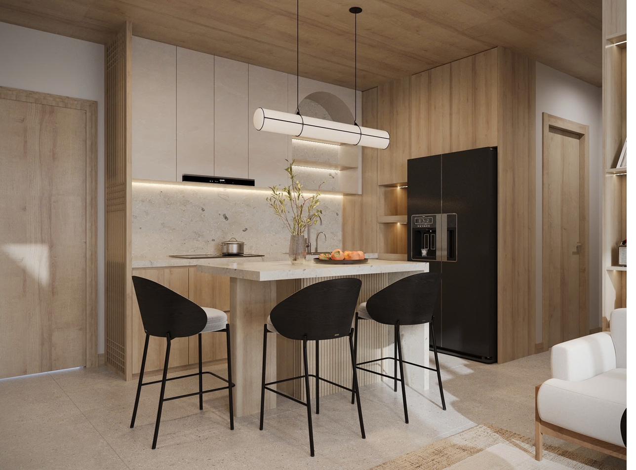 The remodeled kitchen — a honed travertine island with counter seating under a linear pendant